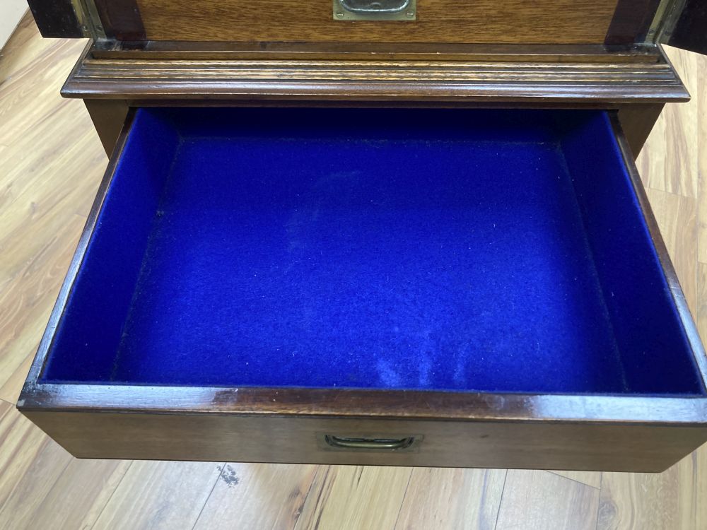 An early 20th century canteen, on stand, with single-lined drawers, lacks contents, width 52cm